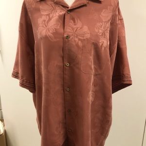 This custom embroidered shirt is one of a kind. It measures 22” across the back